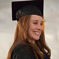 Photo of a graduate smiling